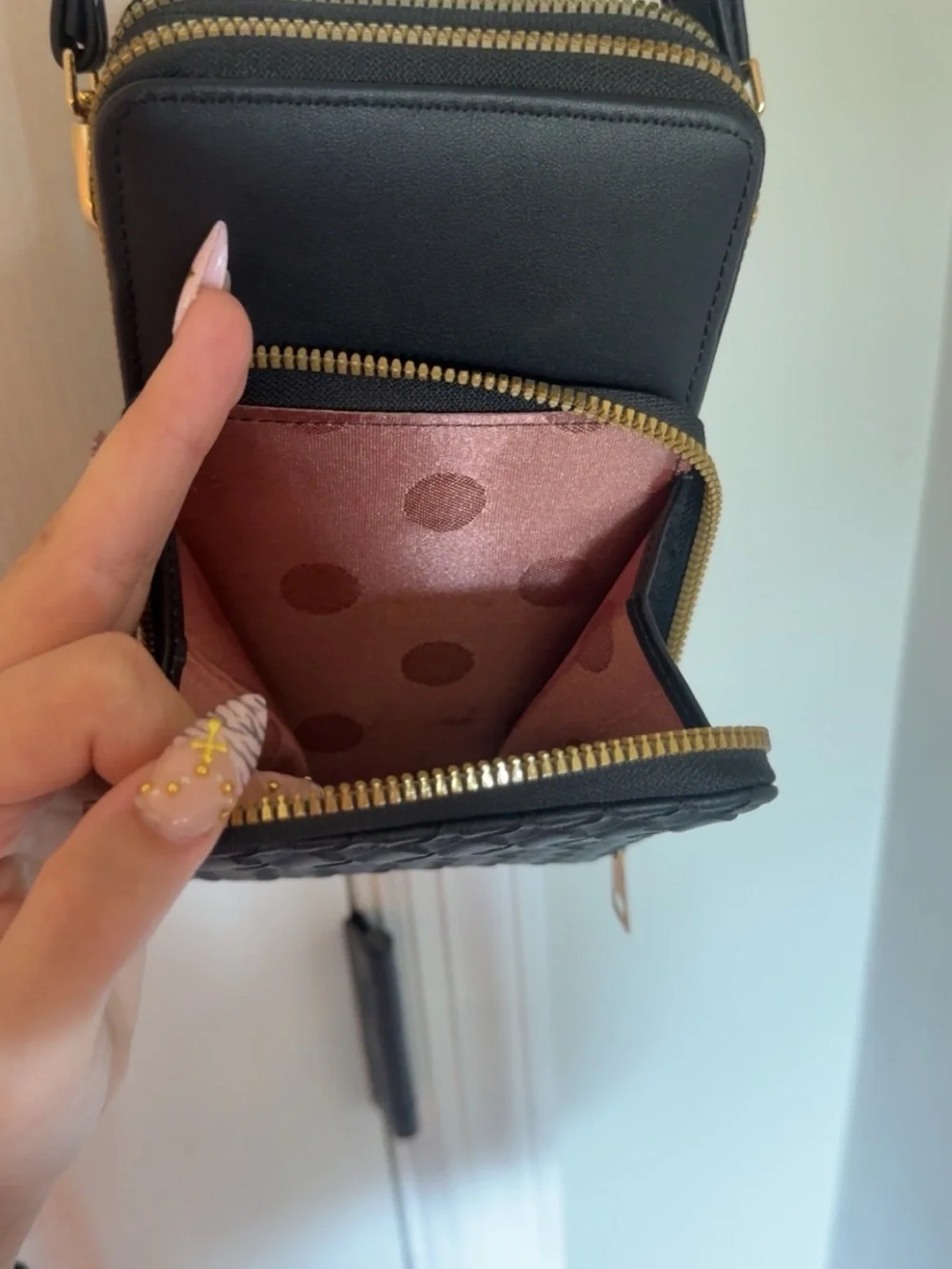 Women's Black Zip-Around Wallet with Polka Dot Interior